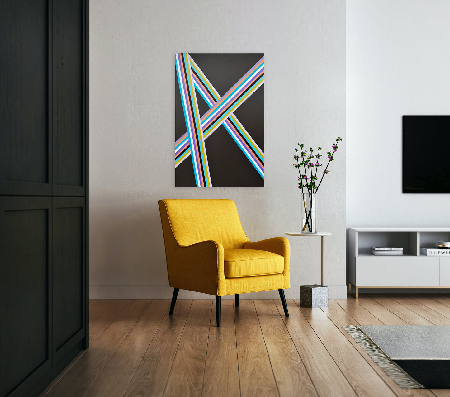 Hard edge painting 'Action!' by Elena Alexander displayed above a mid-century yellow armchair. Vibrant diagonal stripes in turquoise, lavender, and chartreuse create graphic A pattern against dark brown background. Modern geometric art adds pop of color to minimal living space.