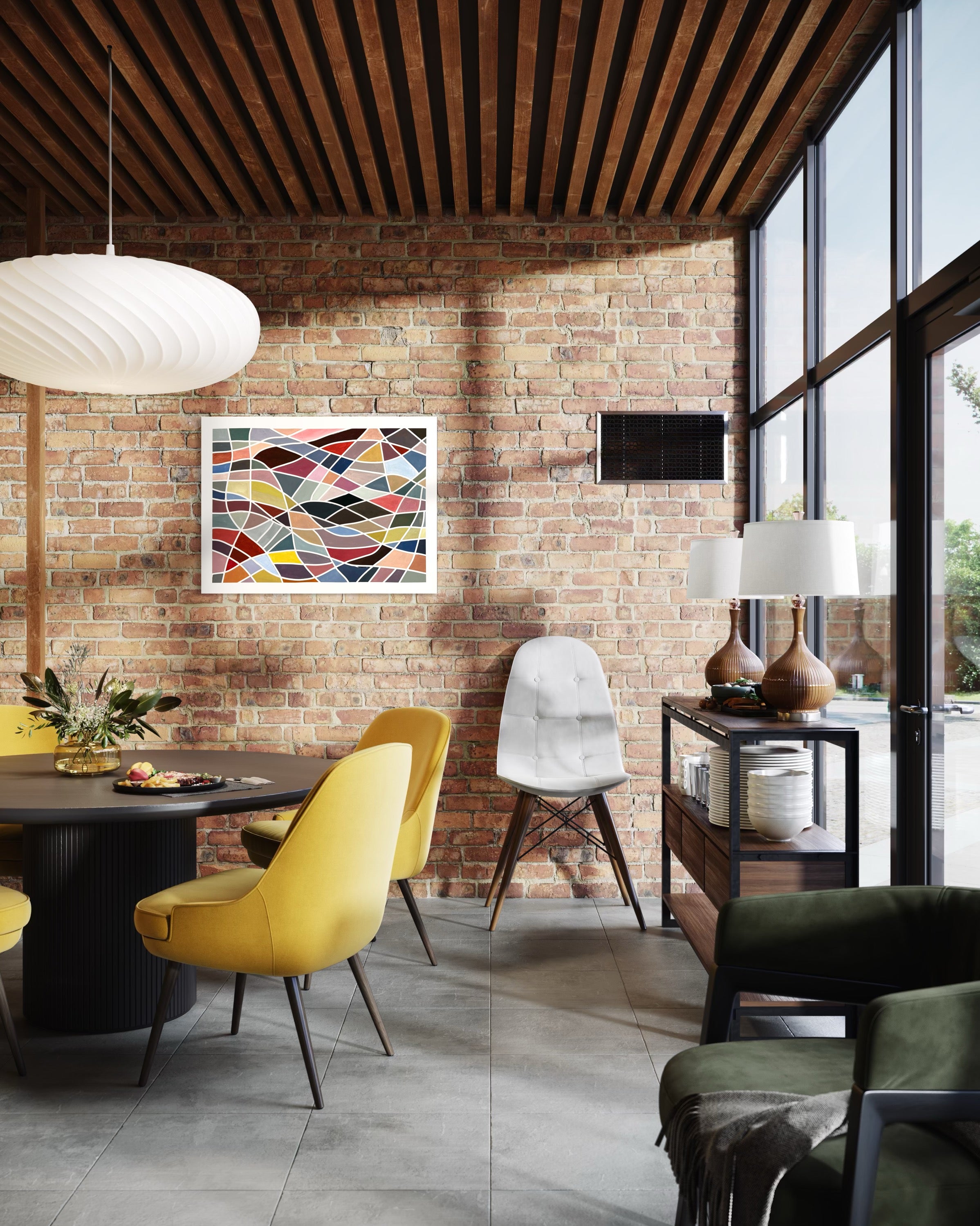 Modern interior with yellow chairs, a brick wall, and Geometric abstract painting ‘Color Grid Series III’ by Elena Alexander