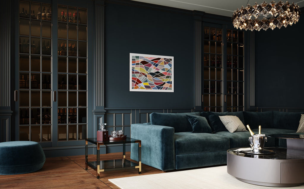 Modern living room with dark walls, a blue sofa, and a Geometric abstract painting ‘Color Grid Series III’ by Elena Alexander