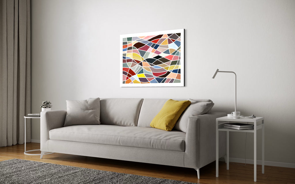 Living room with a gray sofa, colorful Geometric abstract painting ‘Color Grid Series III’ by Elena Alexander, and side tables.