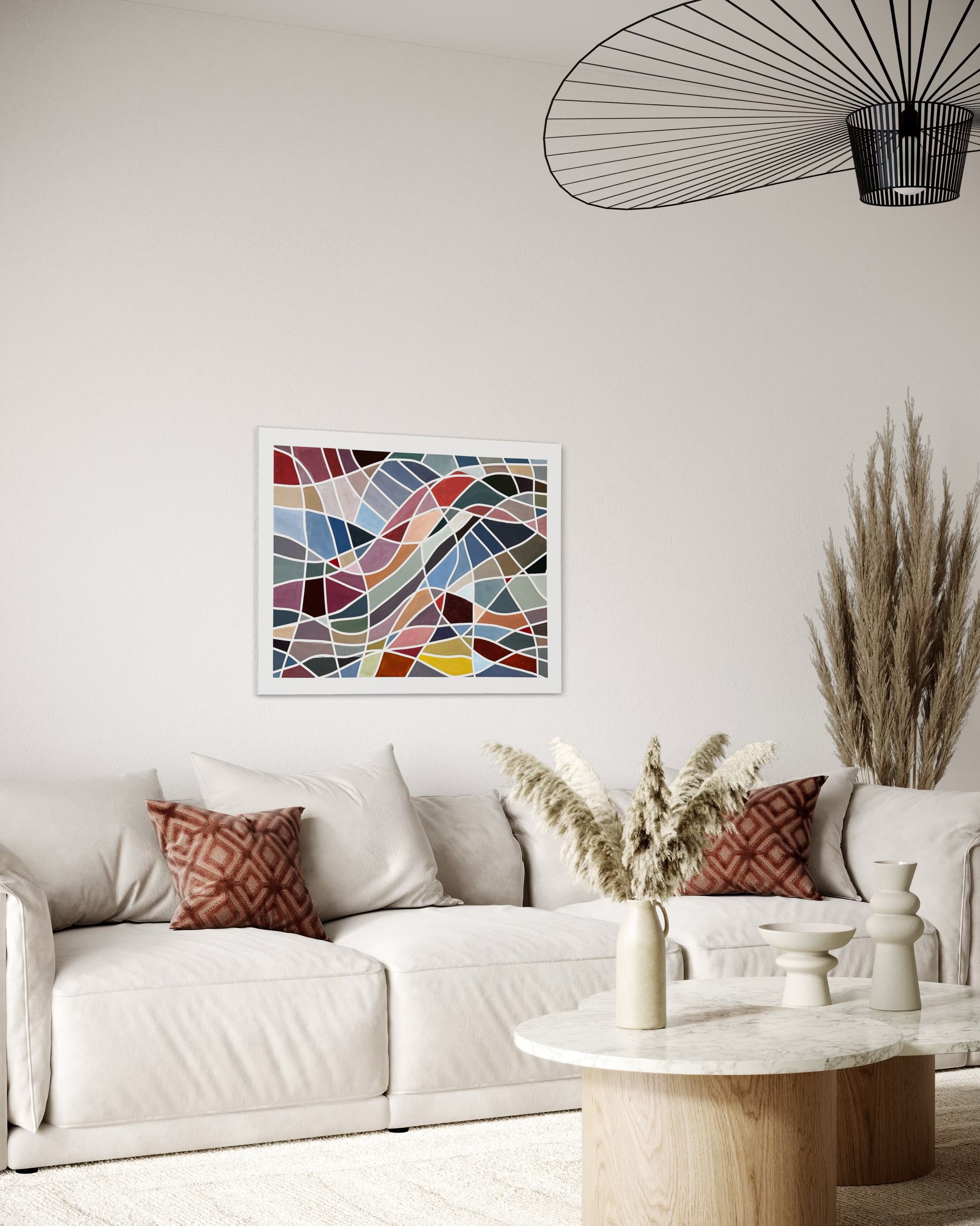 Living room with a colorful Geometric abstract painting ‘Color Grid Series IV’ by Elena Alexander on the wall, white sofa, and decorative elements.
