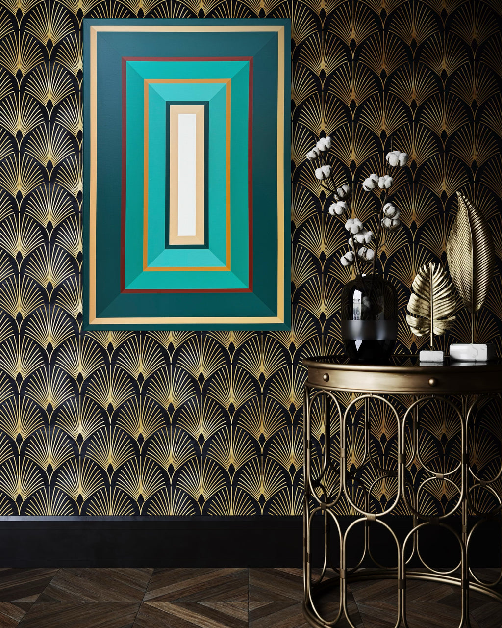 Decorative wall art with geometric pattern on a wall with gold and black patterned wallpaper.