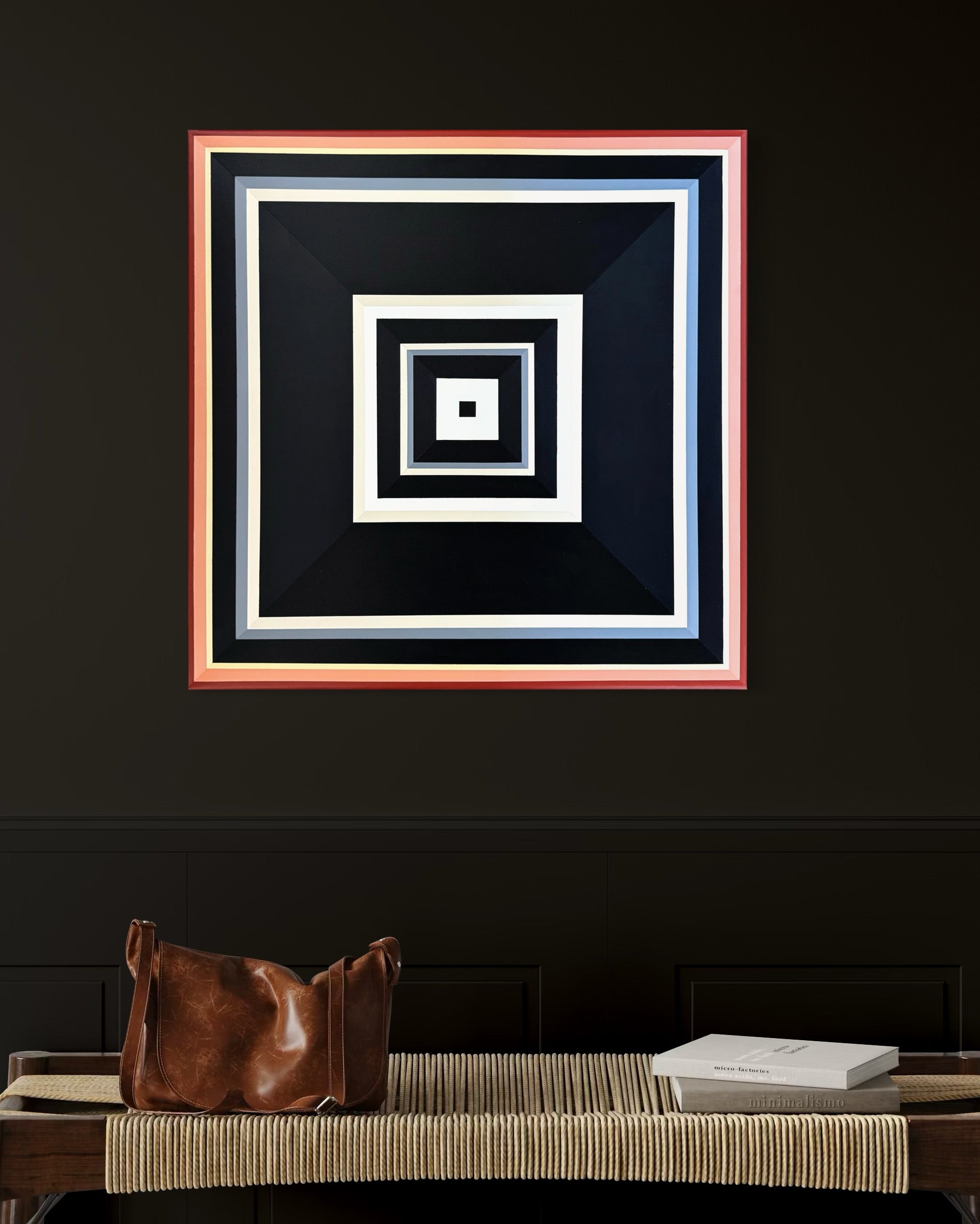 The warm peach tones of the "Black-and-Peach" artwork creating a stunning focal point on a dark, moody accent wall in a sophisticated room.