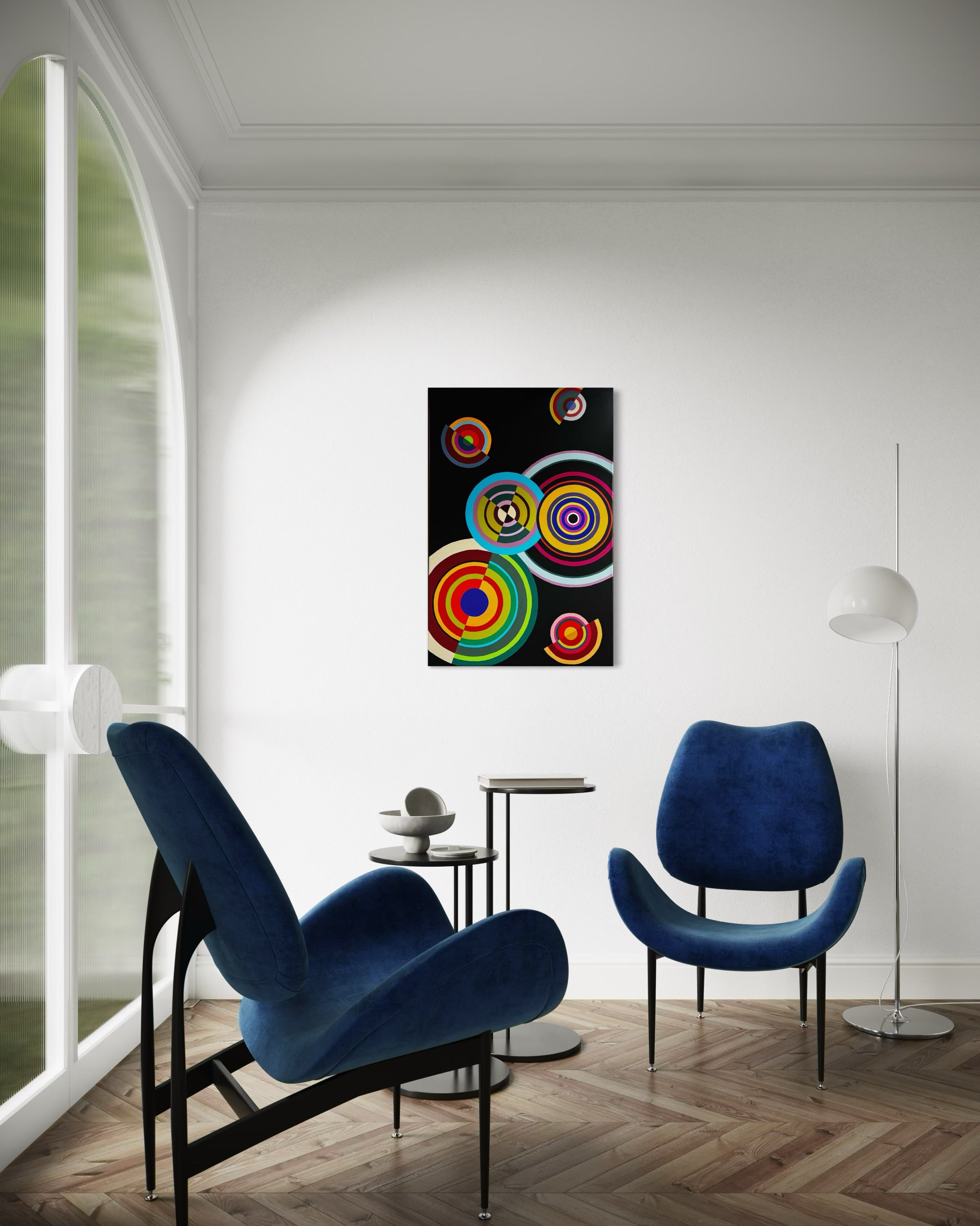 Modern interior with blue chairs and a colorful abstract painting on the wall.