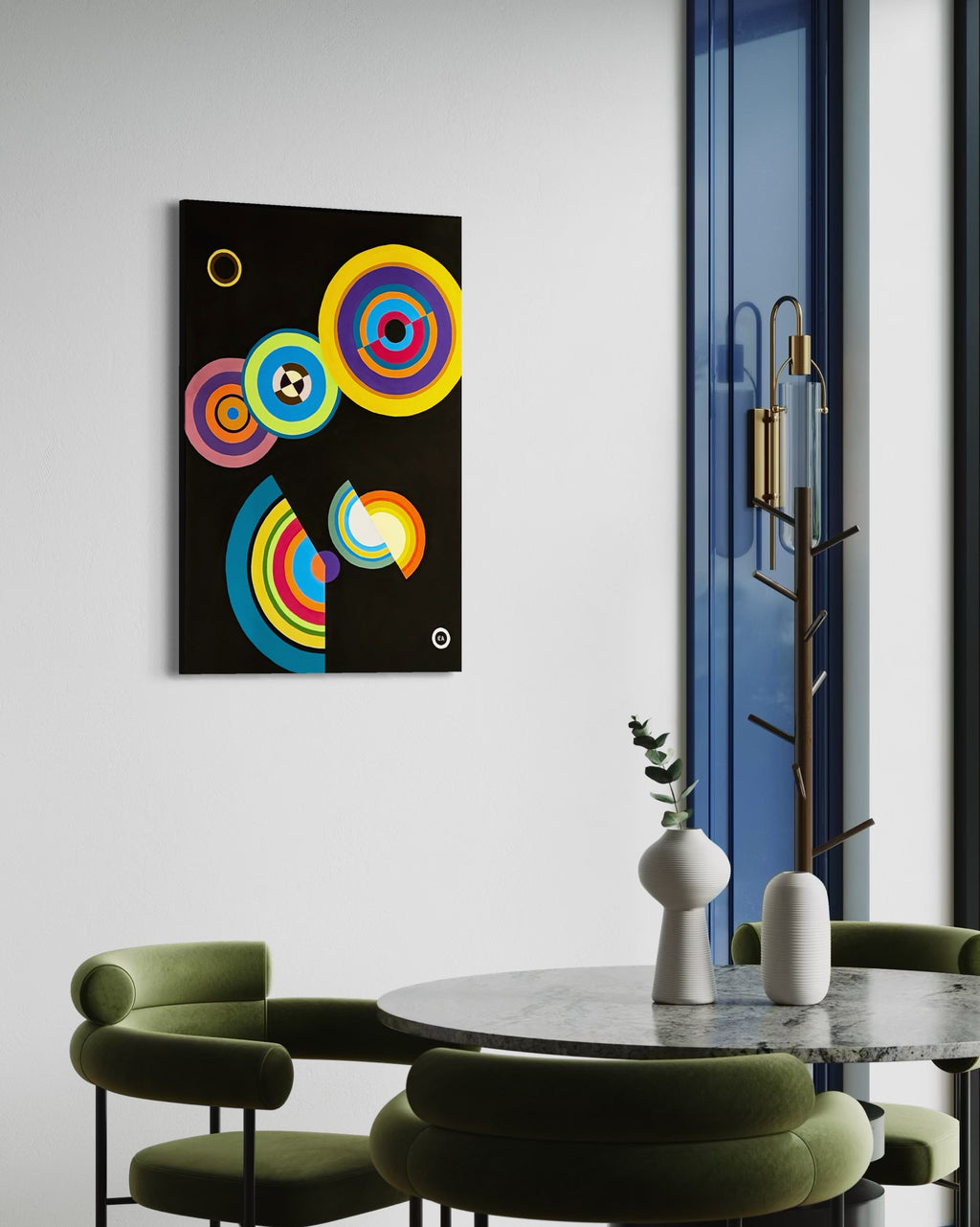 Colorful abstract painting on a wall above a modern dining table with green chairs.