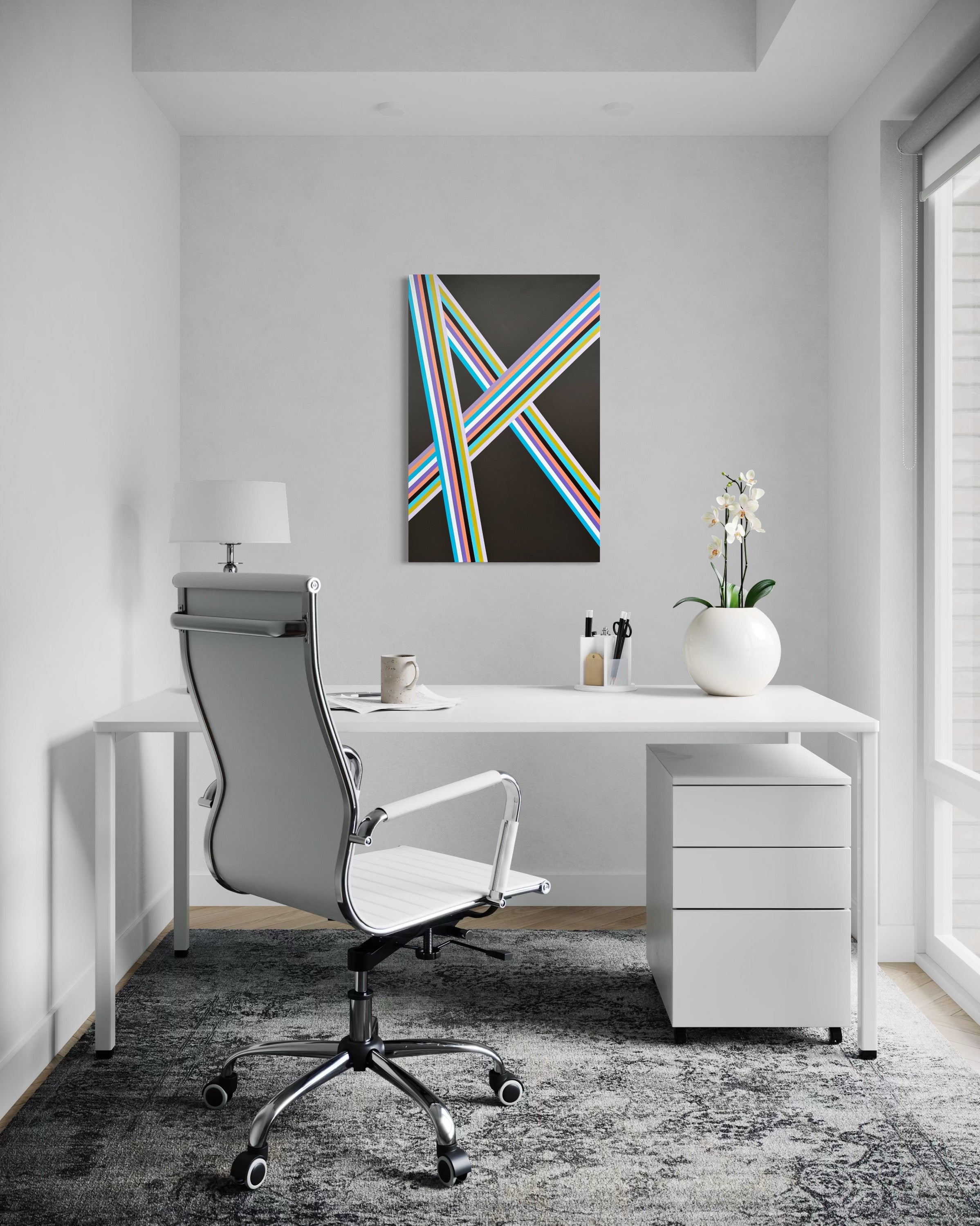 Modern office desk with chair, lamp, and decor in a bright room.