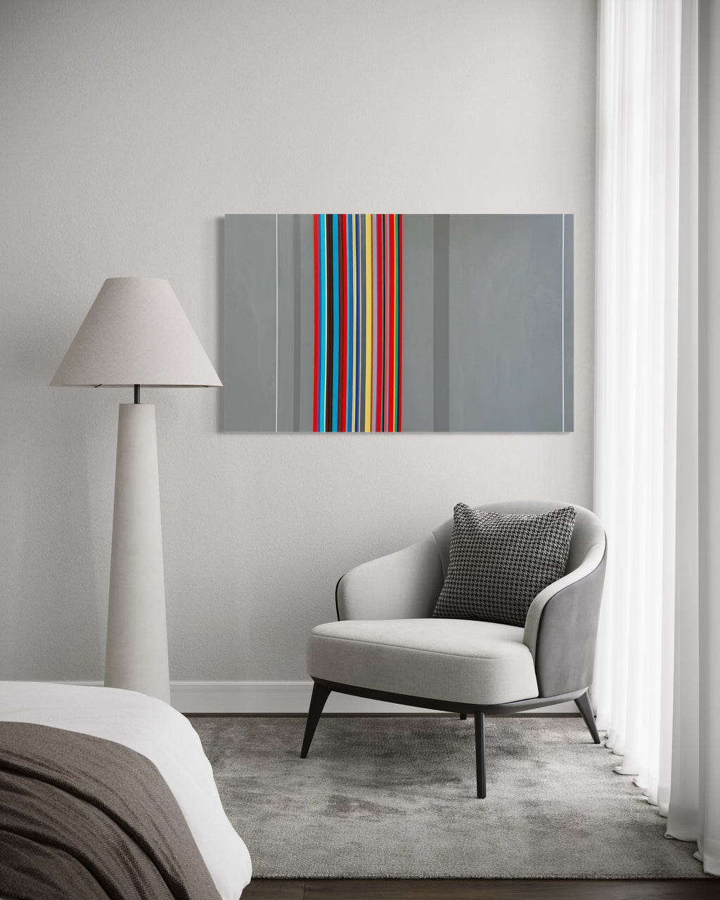 Modern interior with a gray armchair, lamp, and abstract art on the wall.