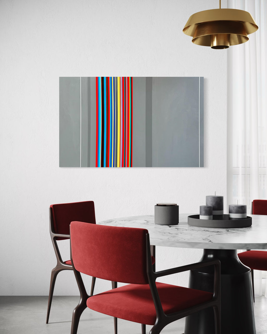 Dining room with red chairs, marble table, and abstract art on the wall.