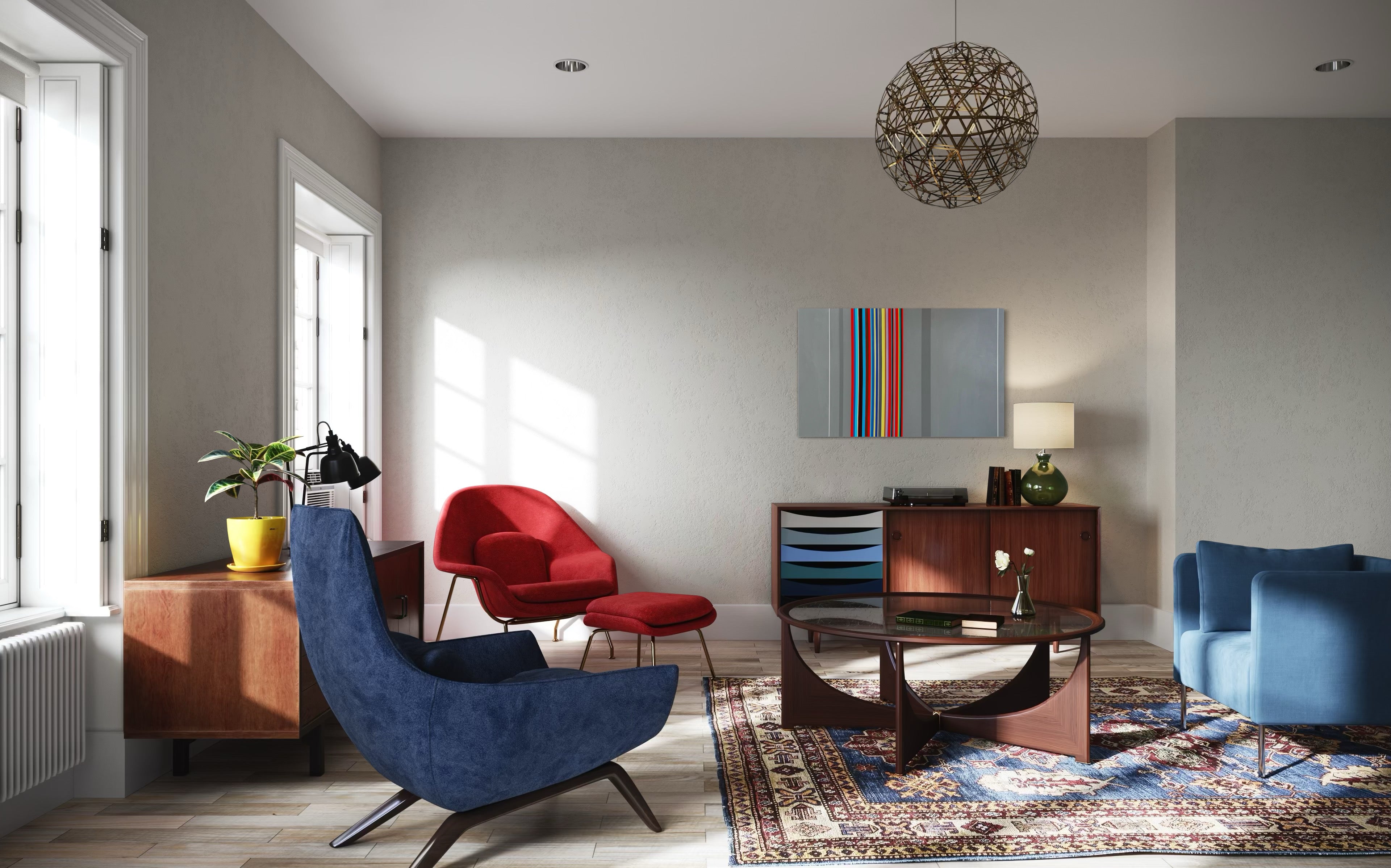 Modern living room with blue and red chairs, a coffee table, and decorative items.