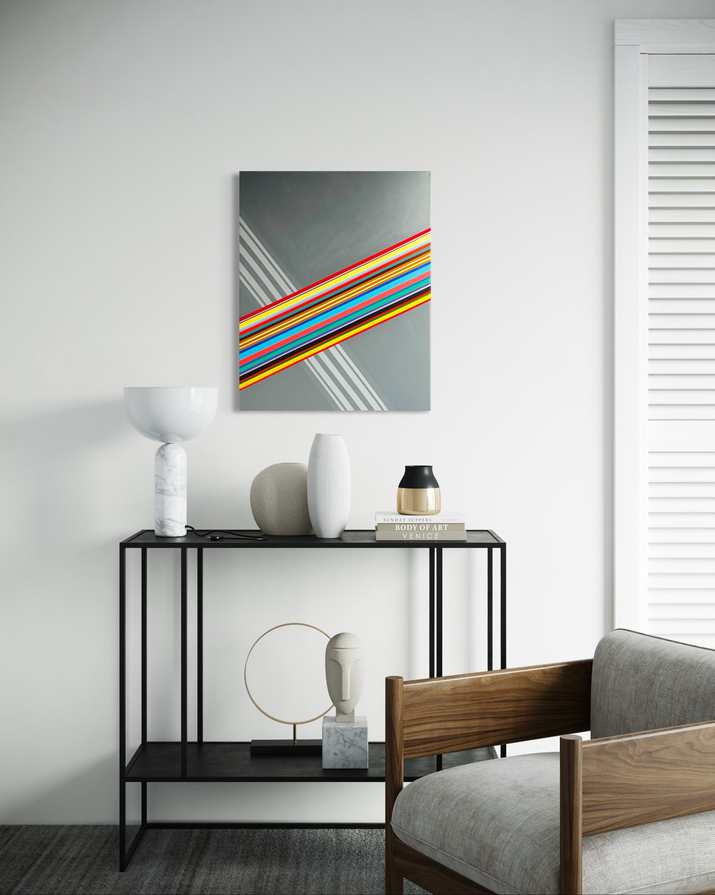 Modern interior with a console table and abstract artwork on the wall