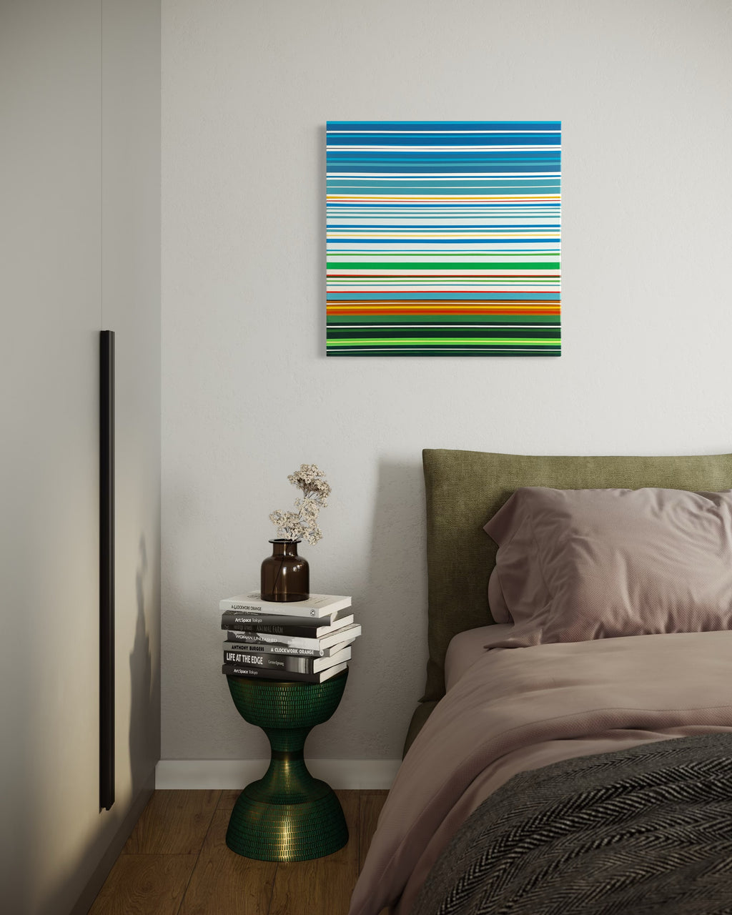 Colorful striped painting on a wall above a bed in a bedroom.