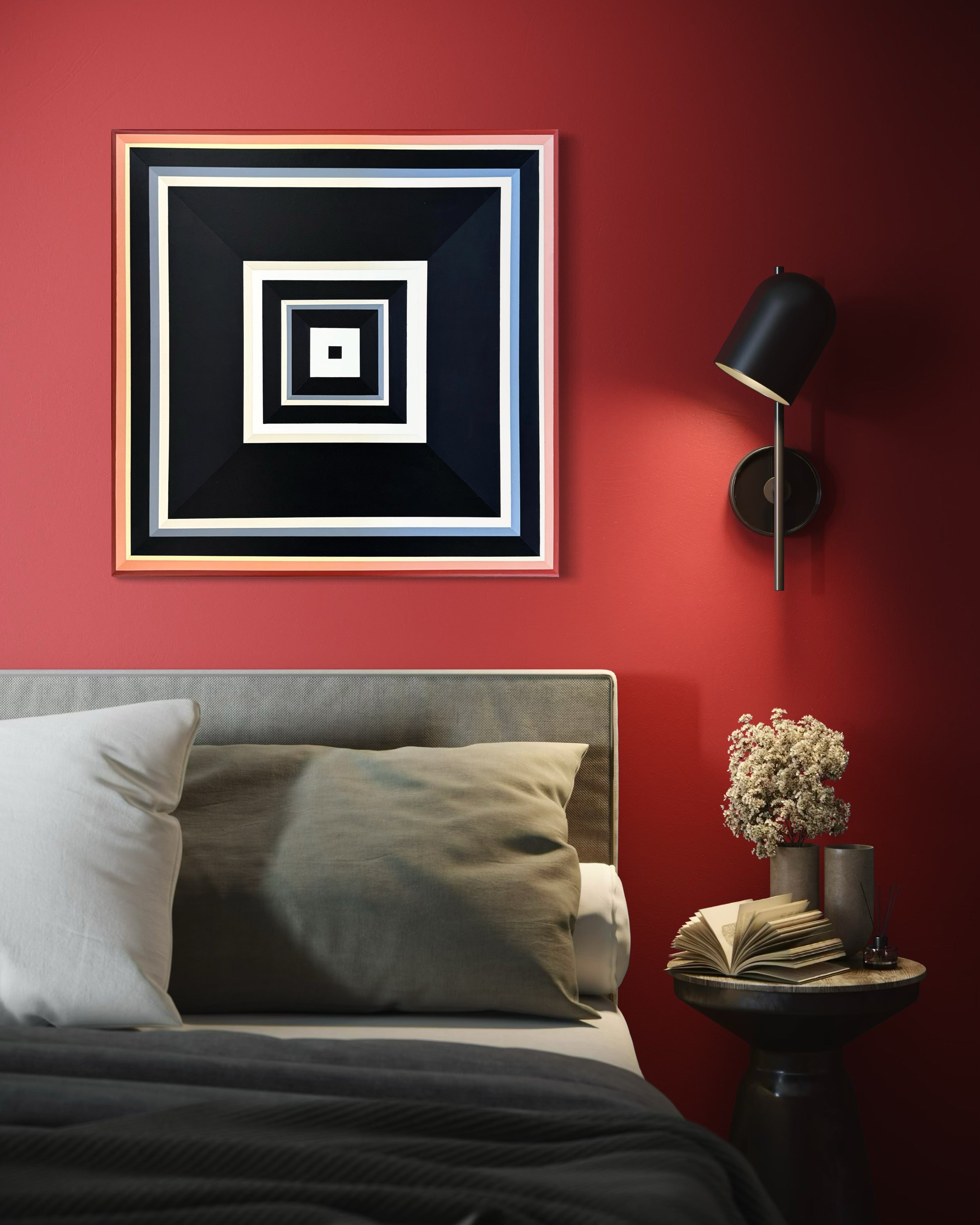 The "Black-and-Peach" geometric painting making a bold statement on a vibrant red wall, hung above a modern bed.