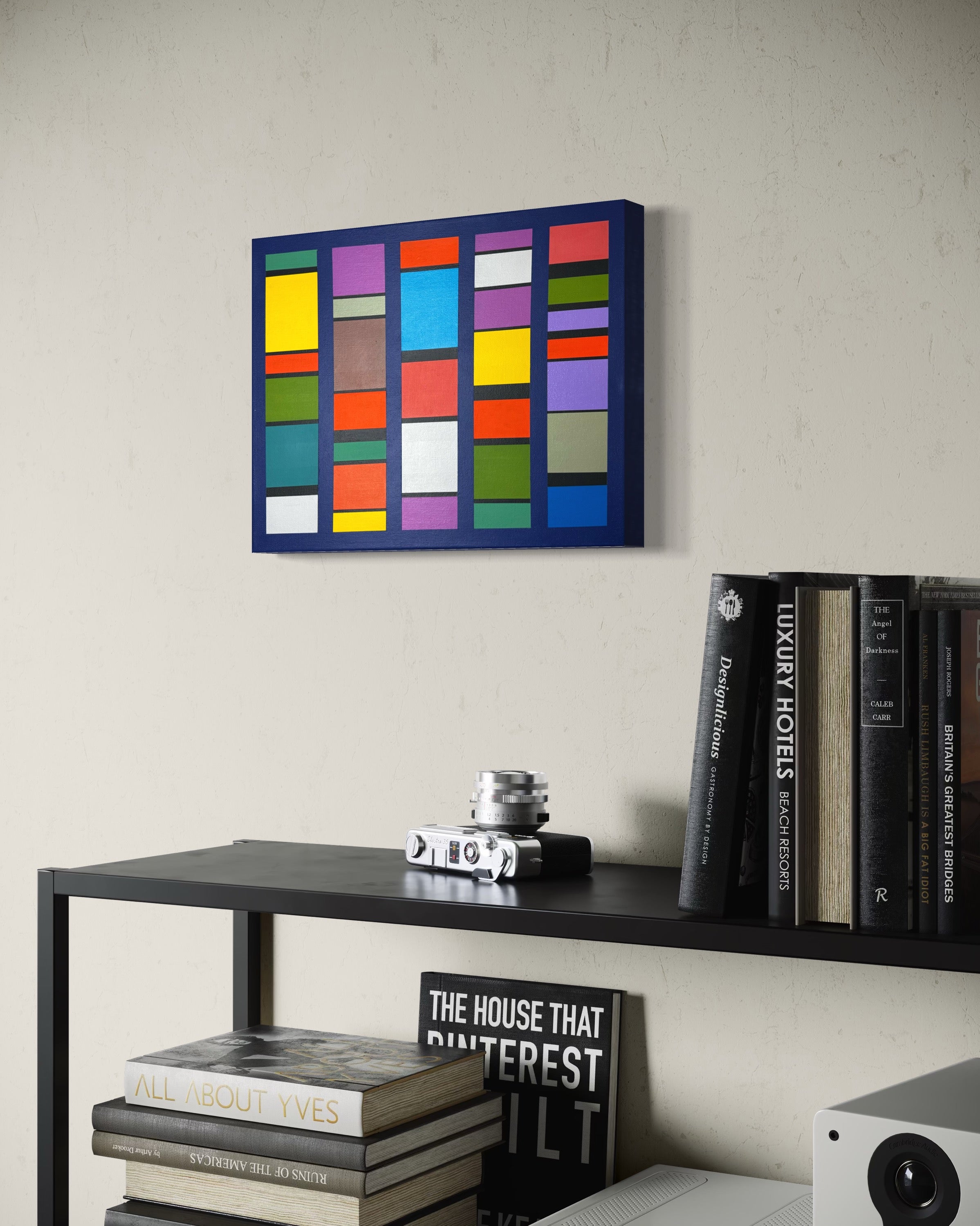 The horizontal "Pulse-Patterns" artwork providing a vibrant and inspiring backdrop in a clean, contemporary workspace.