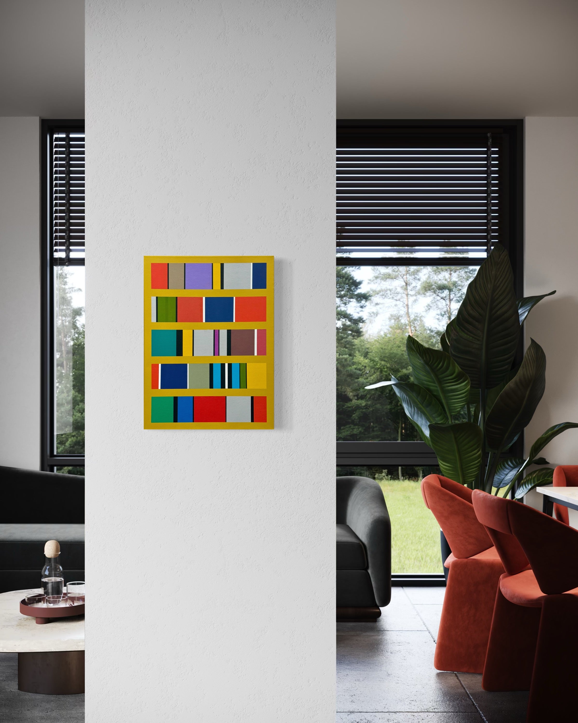 Colorful abstract art piece on a white wall with a modern interior setting.