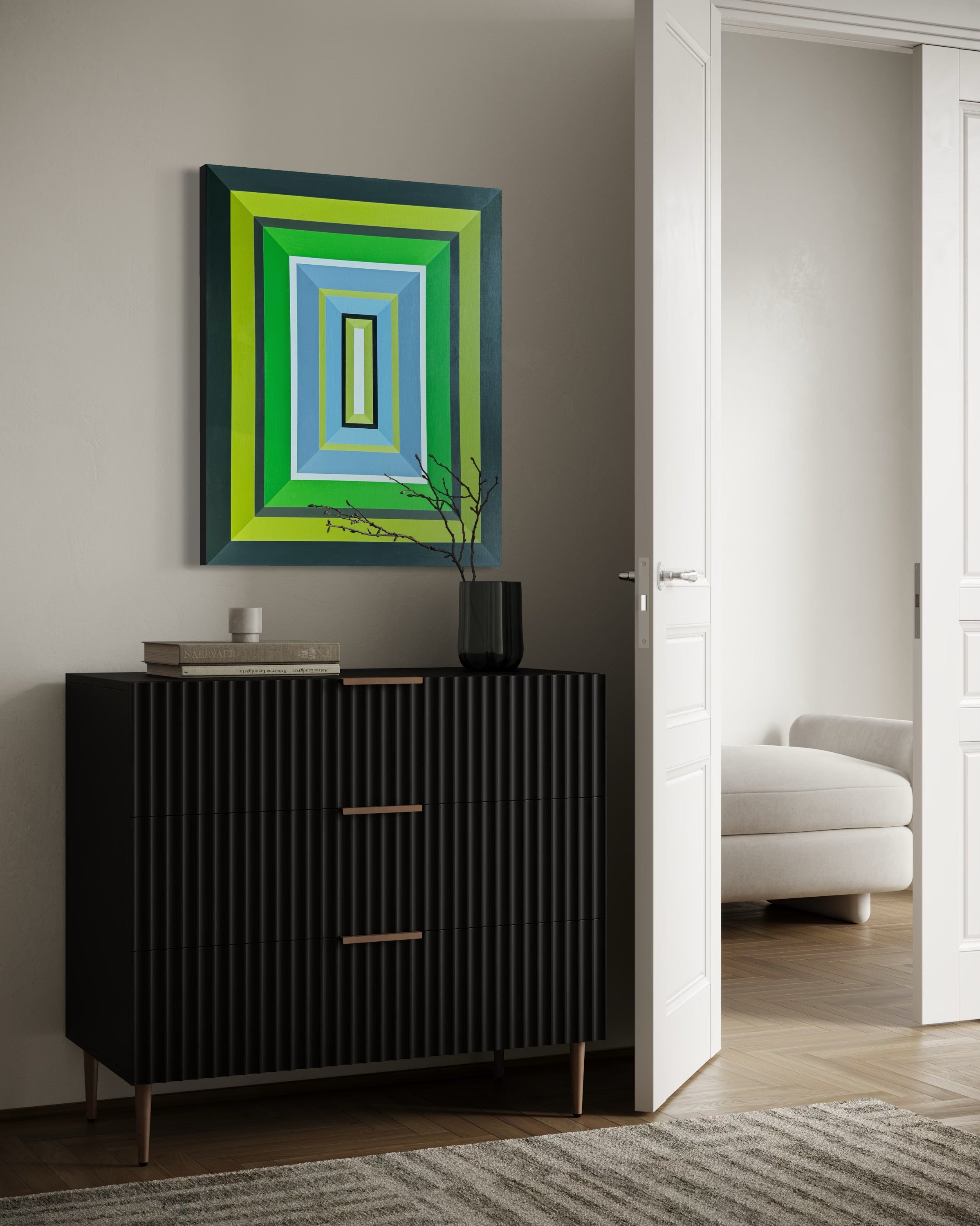 Modern interior with a black cabinet, abstract square-framed artwork, and a white sofa.