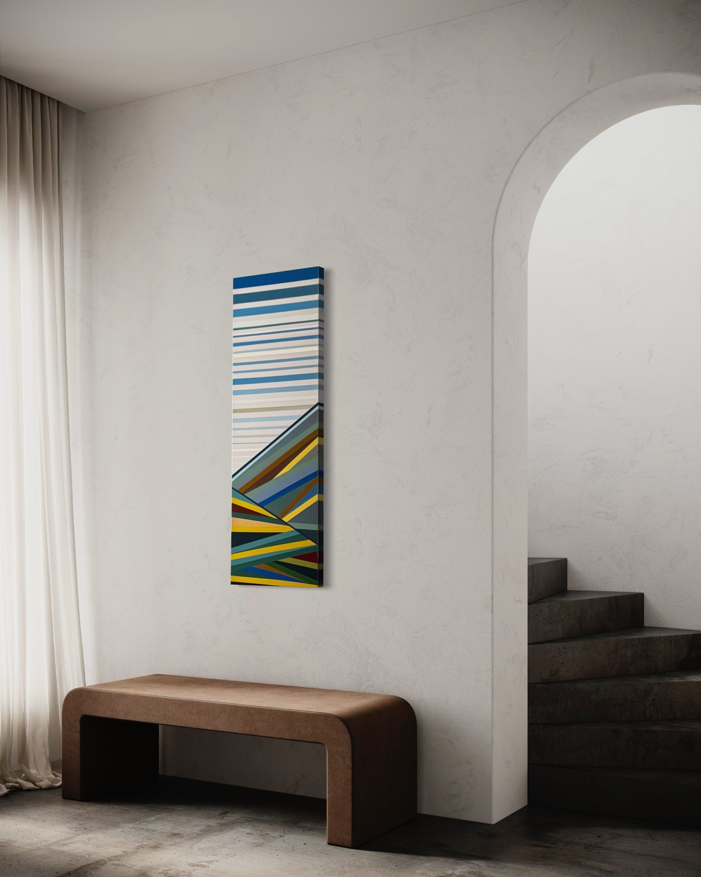 Elena Alexander's "Foothills" painting adding a serene, natural touch to a modern hallway, hung on the wall above a dark wooden bench.