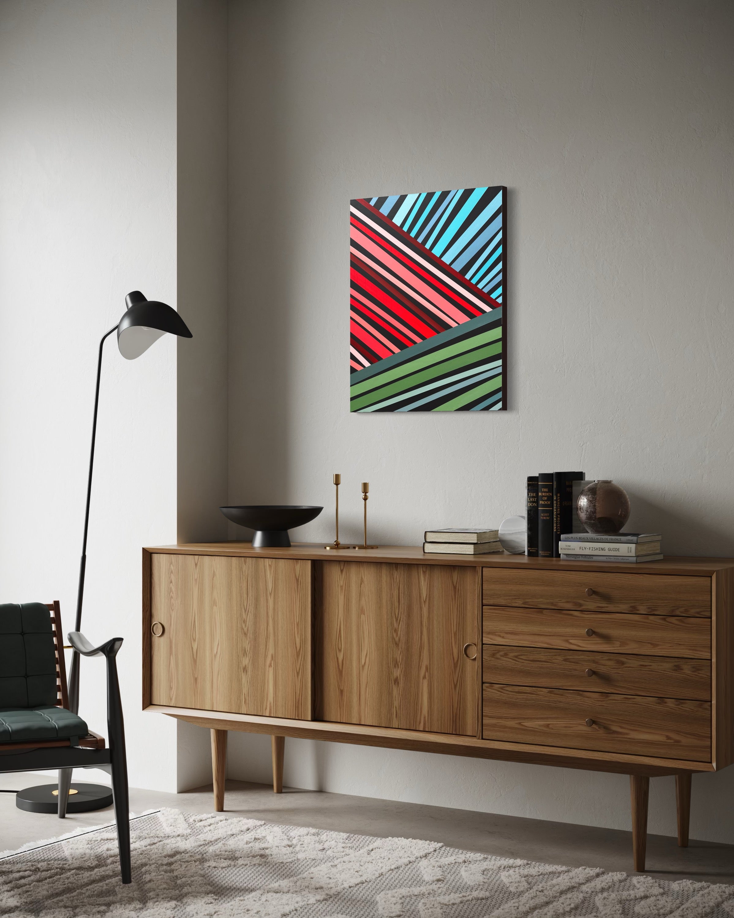 Wooden sideboard with a colorful abstract painting above it in a room.