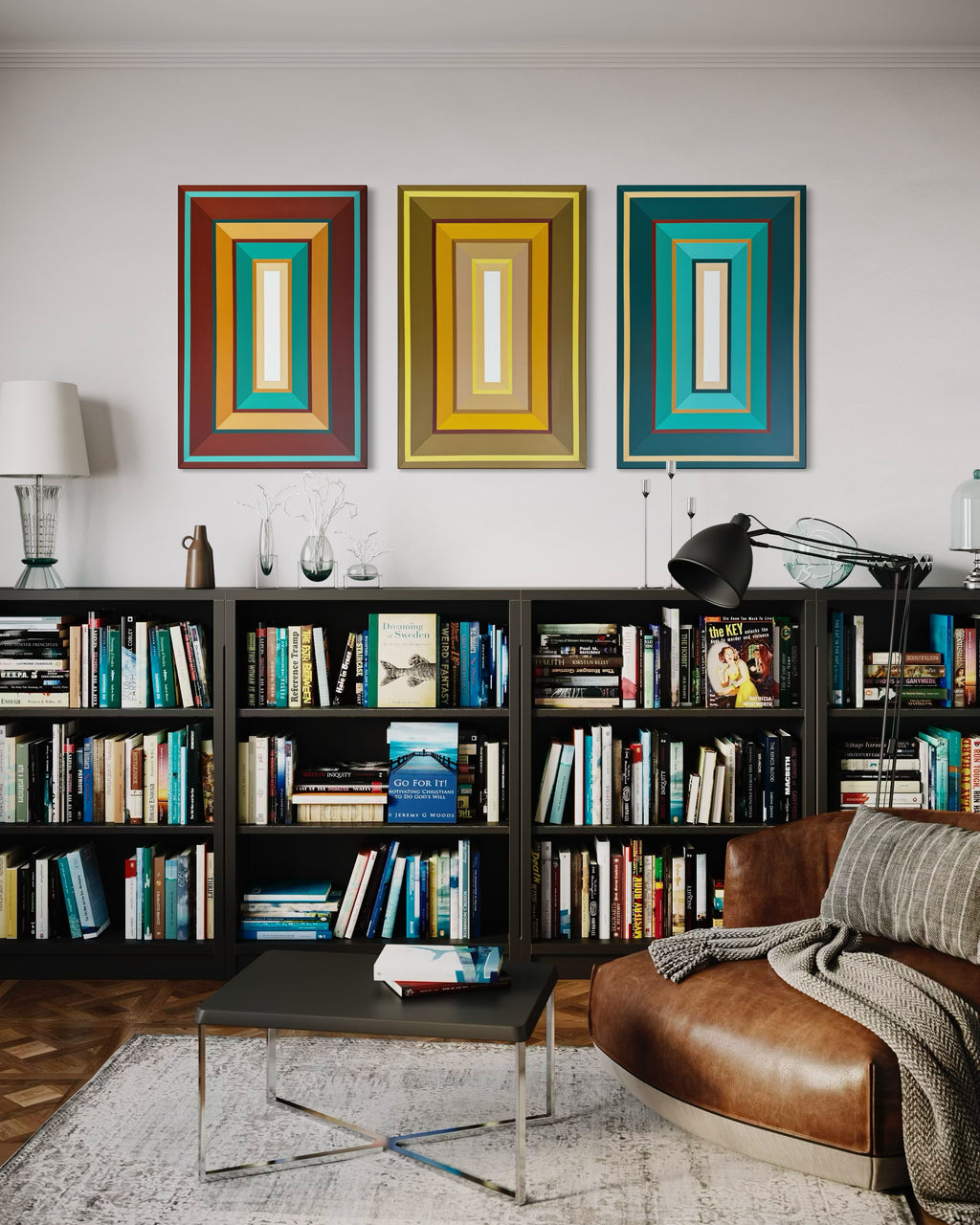Living room with bookshelves, a brown sofa, and colorful abstract paintings on the wall.
